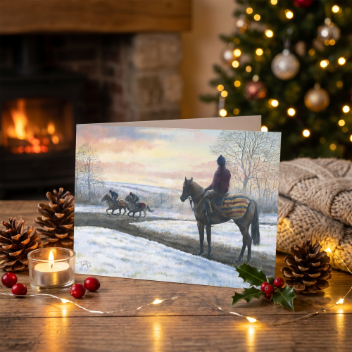 Injured Jockeys Fund Christmas card on a festive table